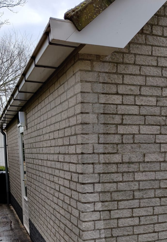 Muur hogedruk reinigen